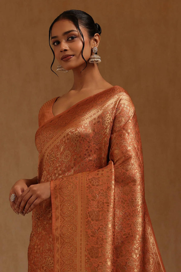 Peach Tussar Floral Zari Woven Saree